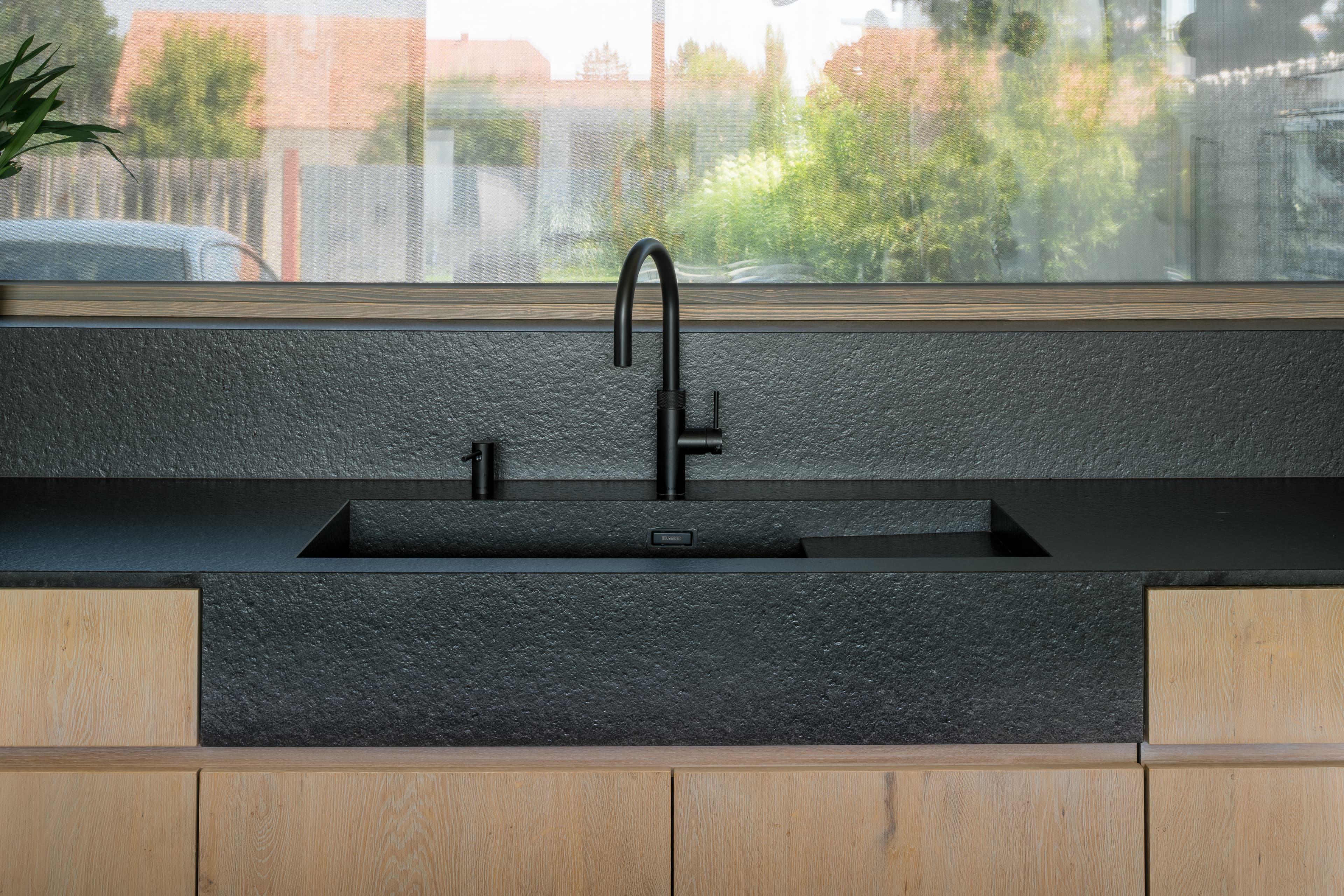 Kitchen area with integrated design and custom cabinetry.